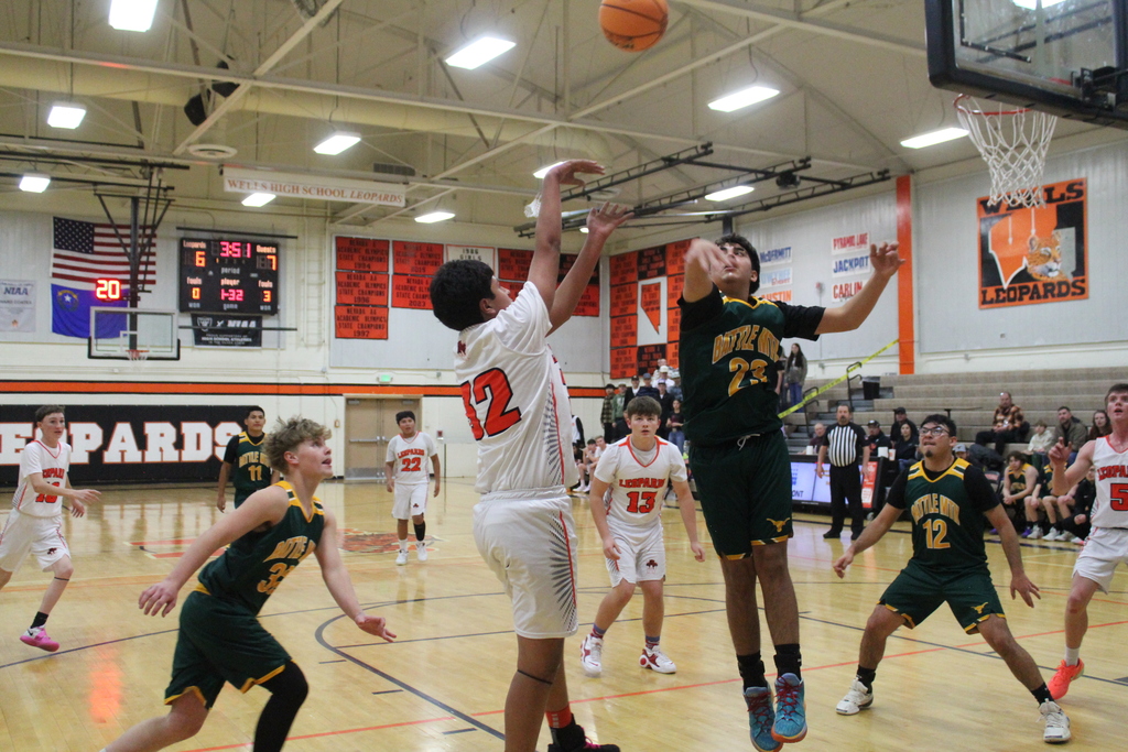 Wells JV basketball team playing Battle Mountain