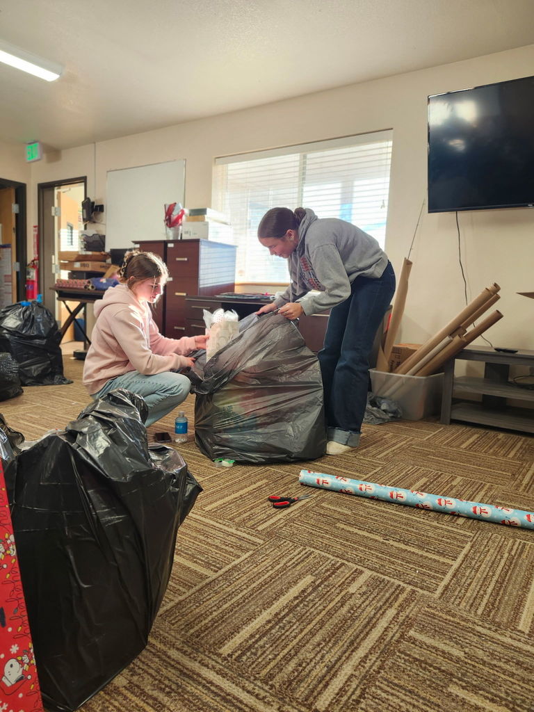 FFA members wrapping presents