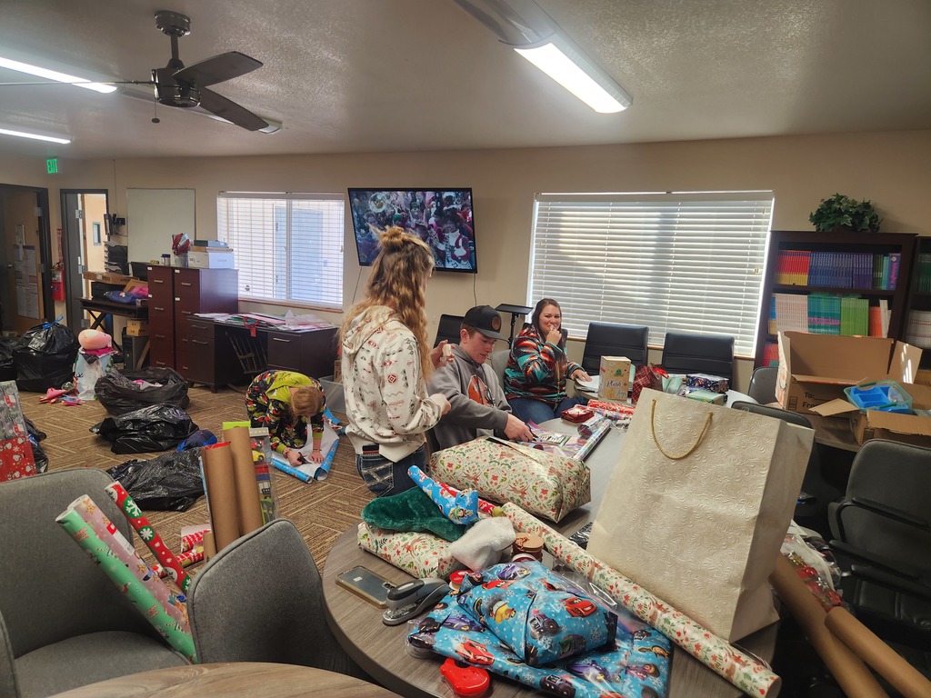 FFA members wrapping presents