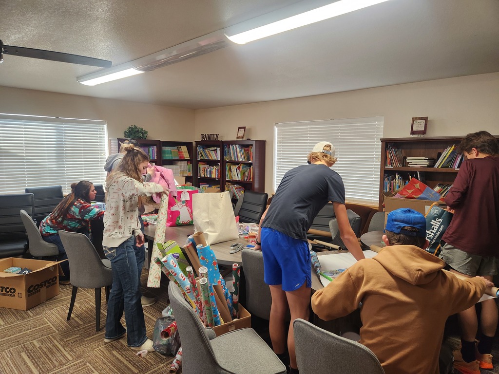 FFA members wrapping presents