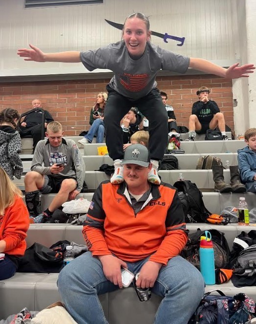 Coach Tele and wrestler Tegan