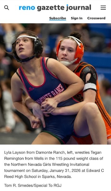 Wells High School wrestlers at the qualifiers