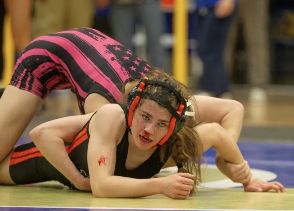 Wells High School wrestlers at the qualifiers