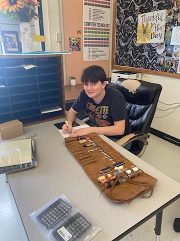 PAES lab students working in their calssroom