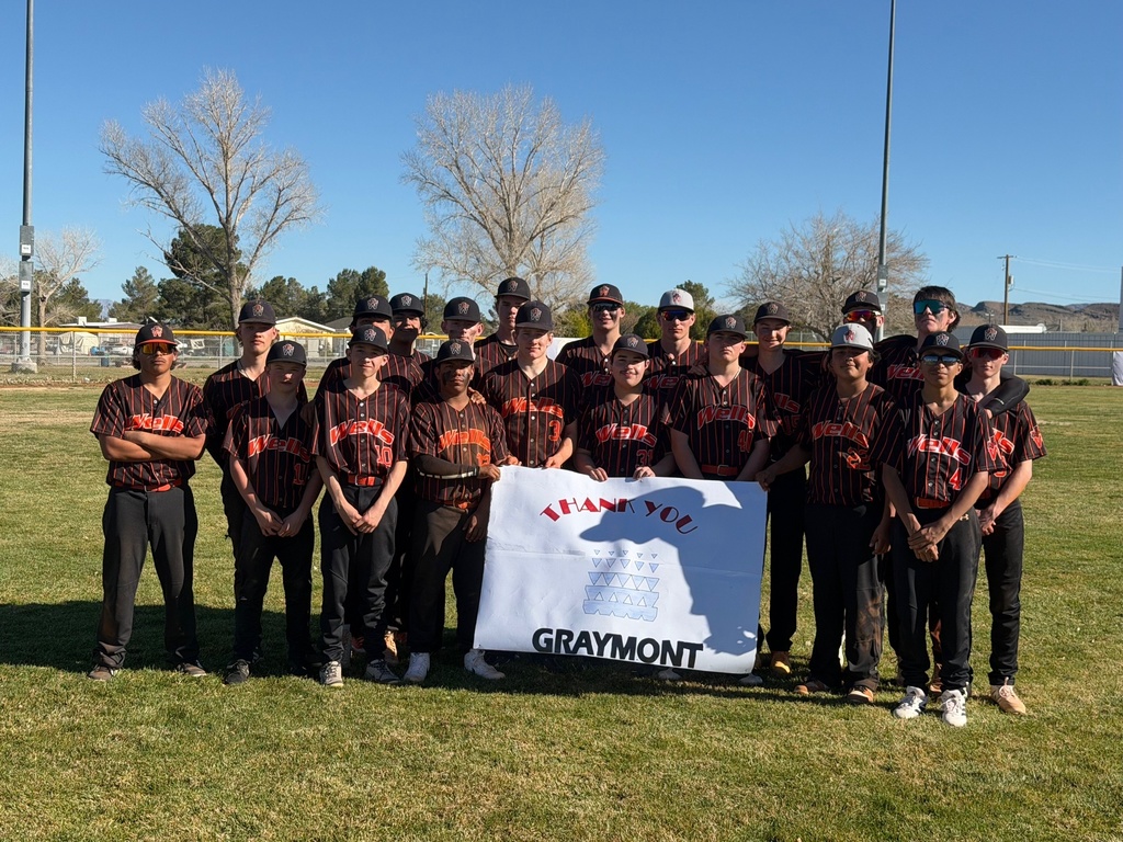 WHS team with a thank you banner
