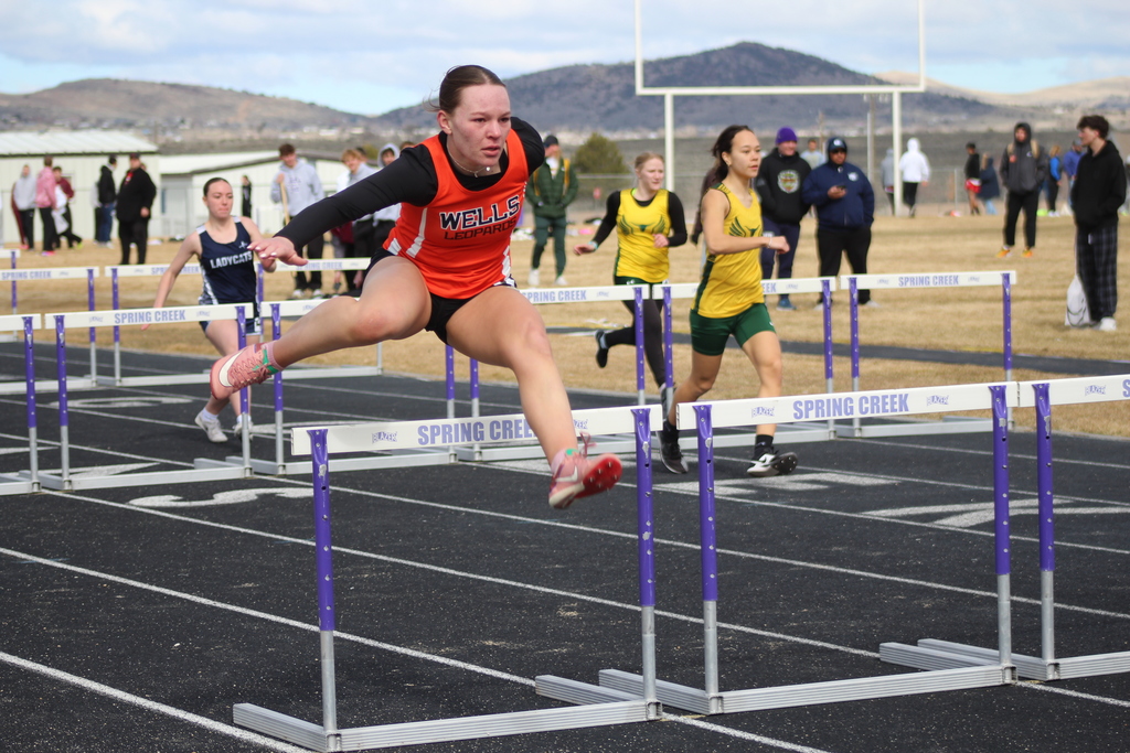 WHS track team members competing
