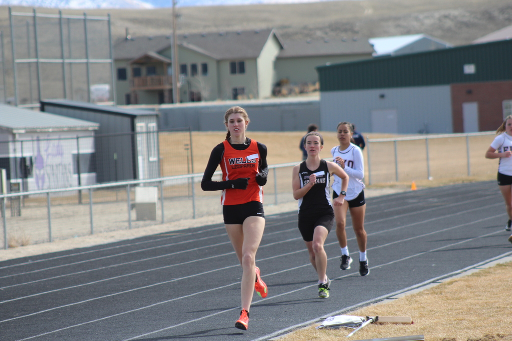 WHS track team members competing