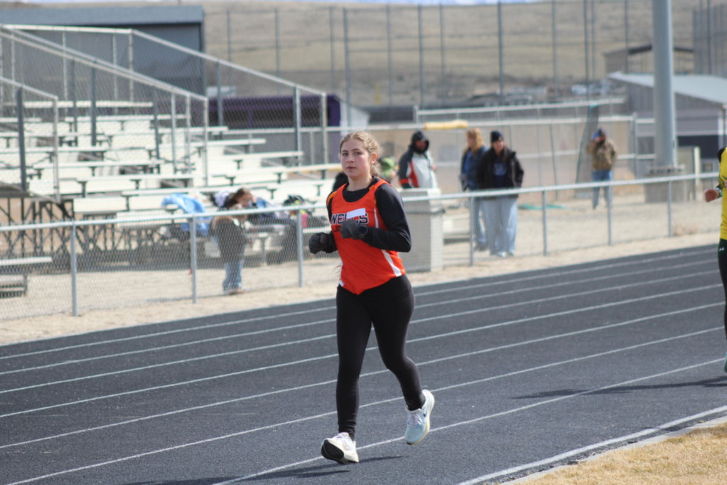 WHS track team members competing