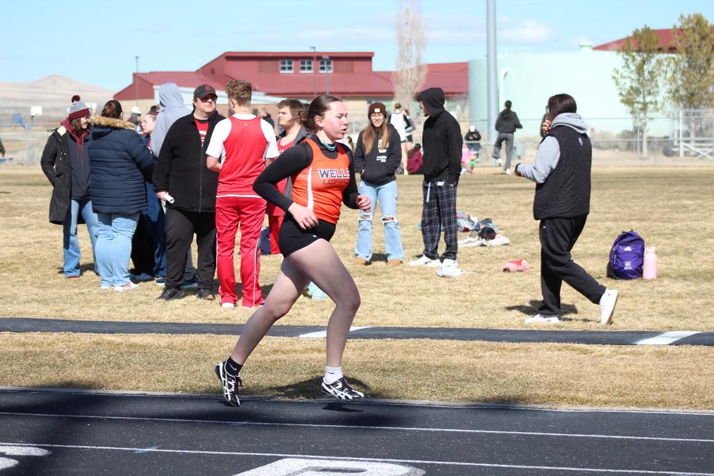 WHS track team members competing