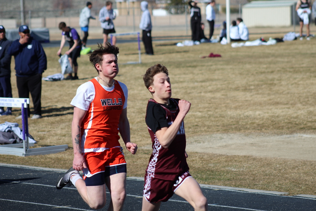 Wells High School boys track team competing