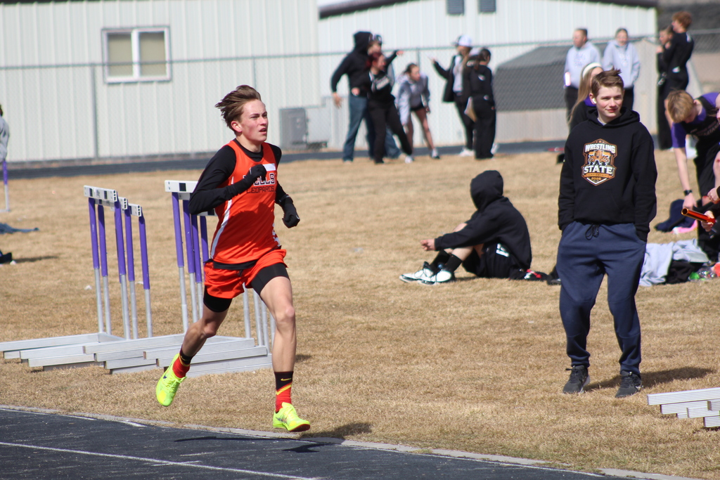 Wells High School boys track team competing