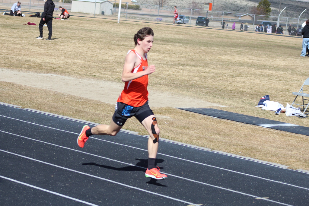 Wells High School boys track team competing