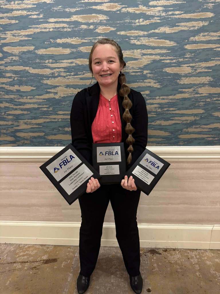 FBLA students with their awards at the state competition