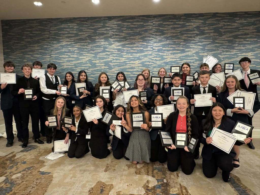 FBLA students with their awards at the state competition