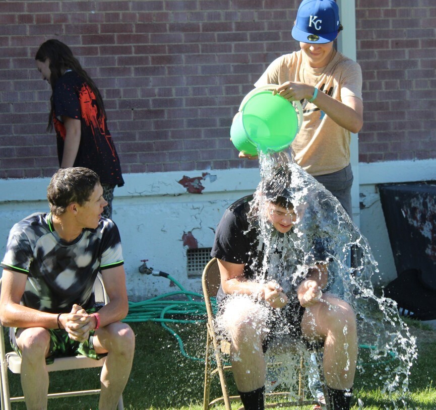 Senior water bucket dump