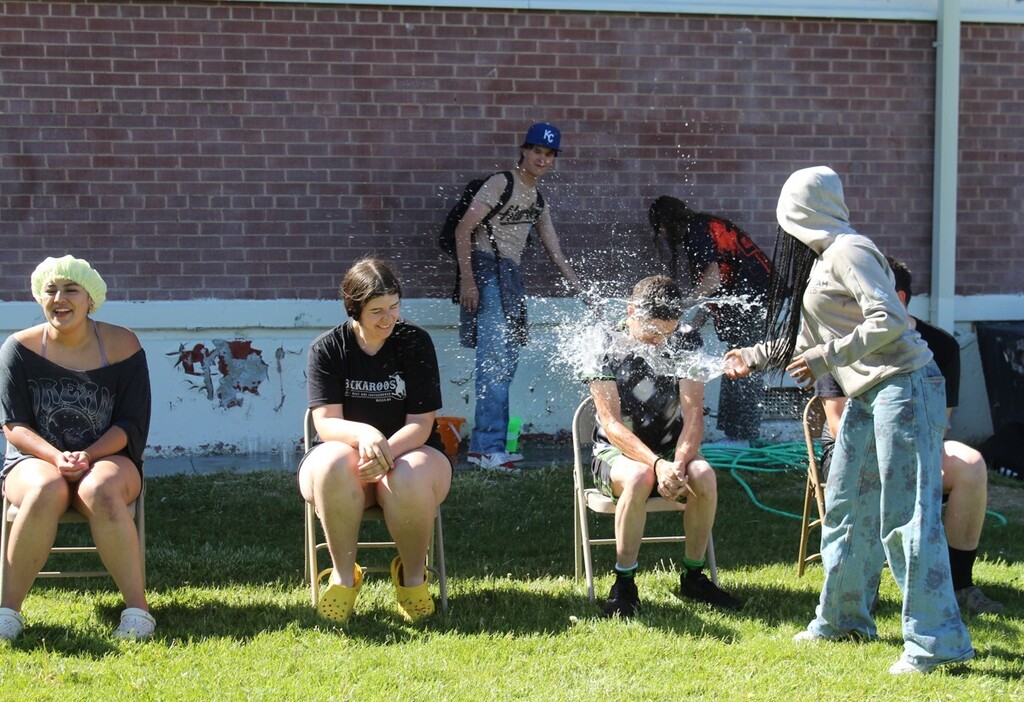 Senior water bucket dump