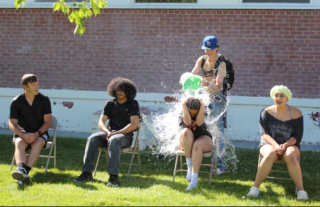 Senior water bucket dump