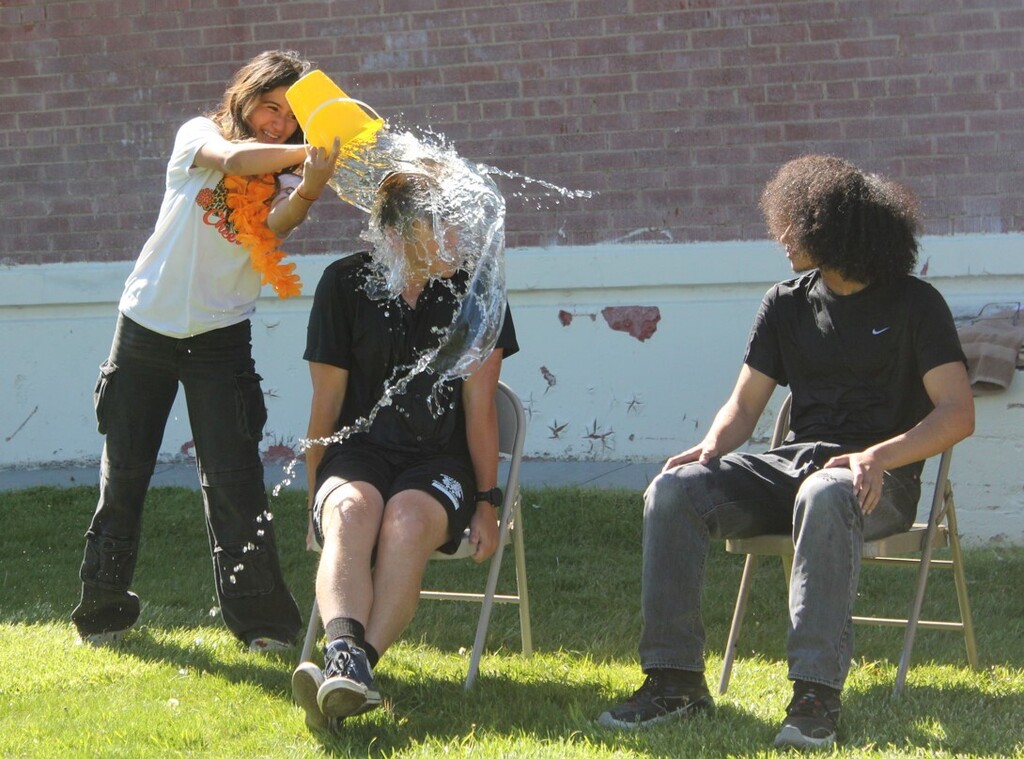 Senior water bucket dump