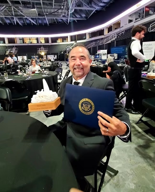 Mr .Noorda receiving an award