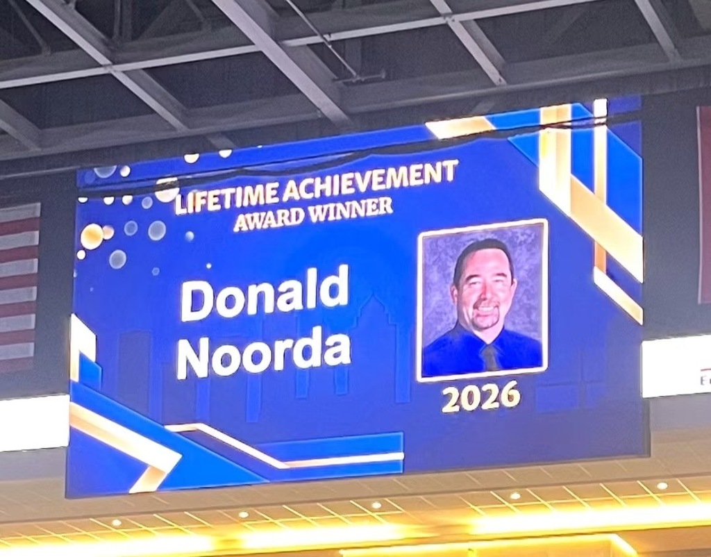Mr .Noorda receiving an award