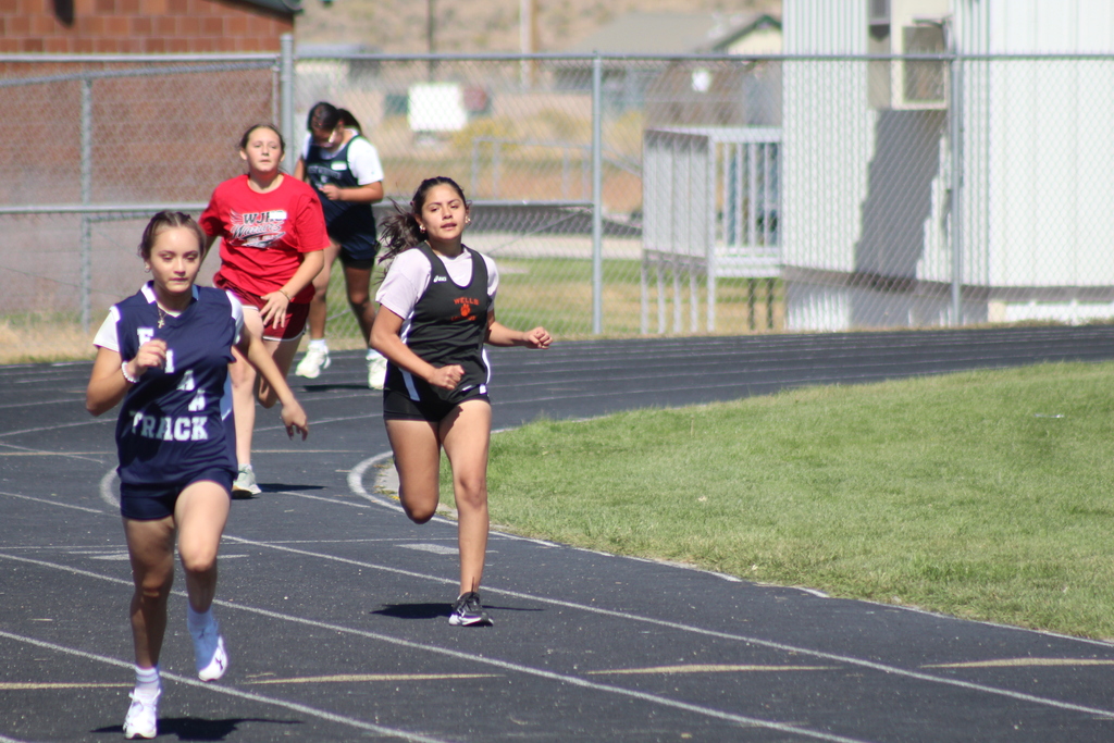 Intramural kids running in Spring Creek