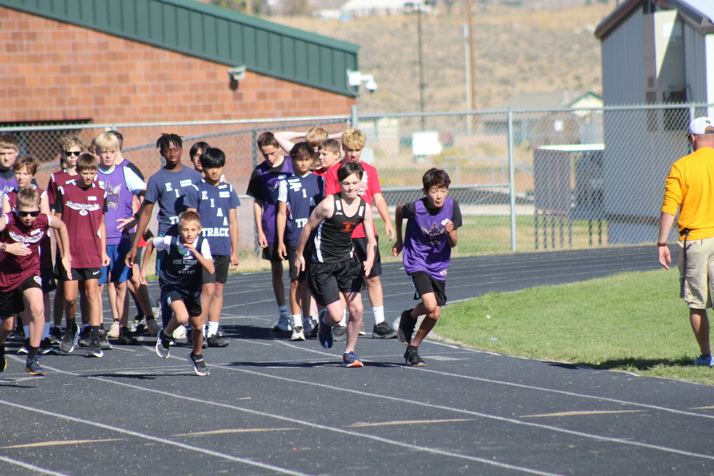 Intramural kids running in Spring Creek
