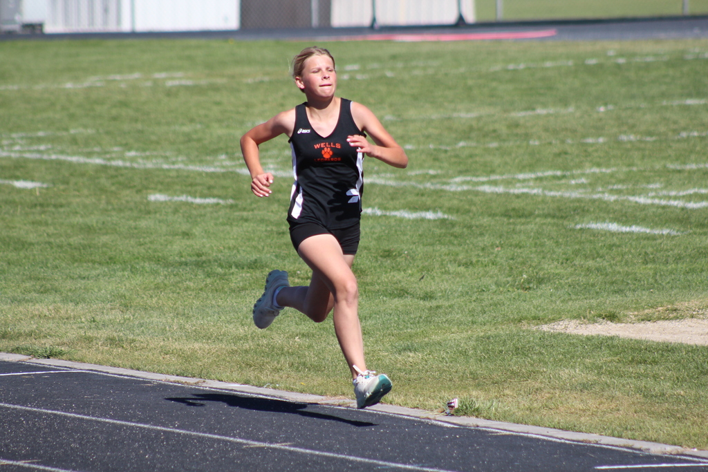 Intramural kids running in Spring Creek