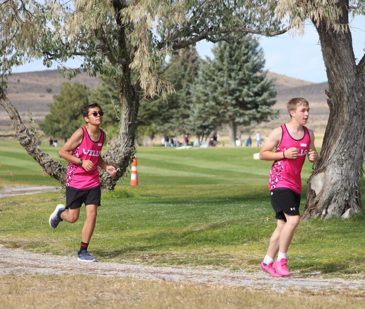 Wells cross country runners at the Wells Invitational