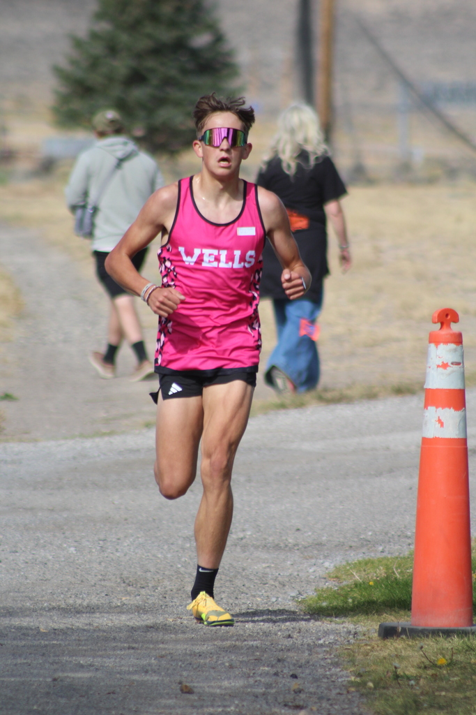 Wells cross country runners at the Wells Invitational