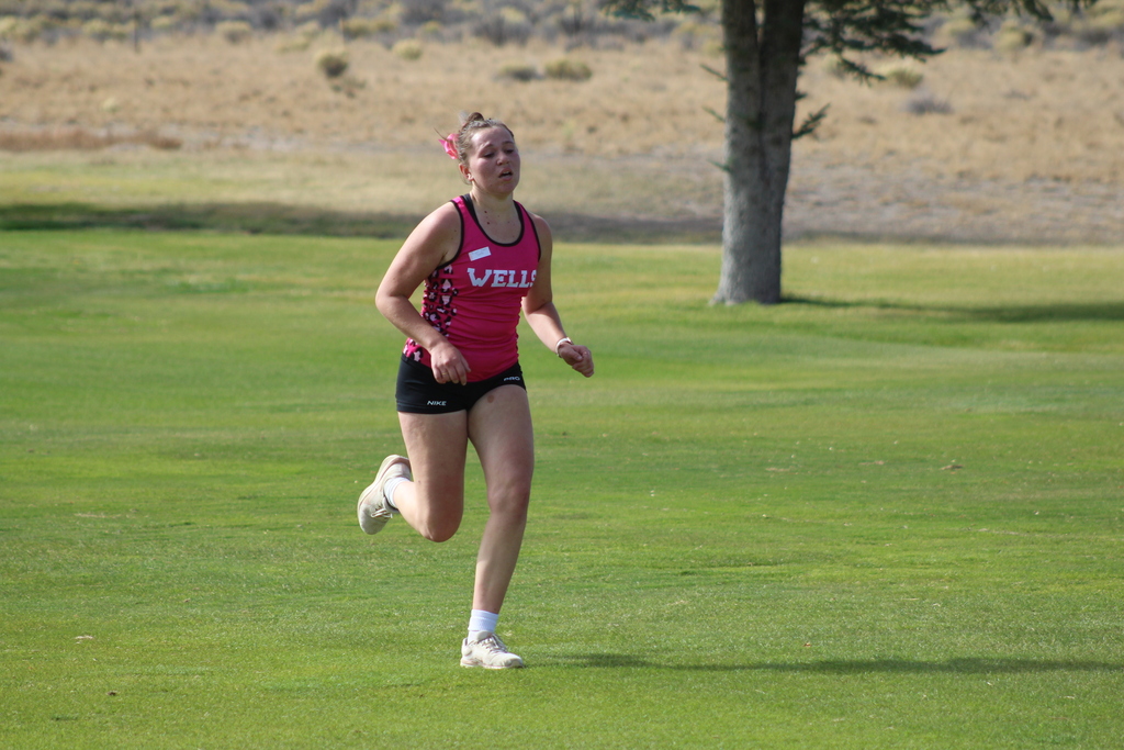 Wells High School cross country runner at the Chimney Rock Golf Course