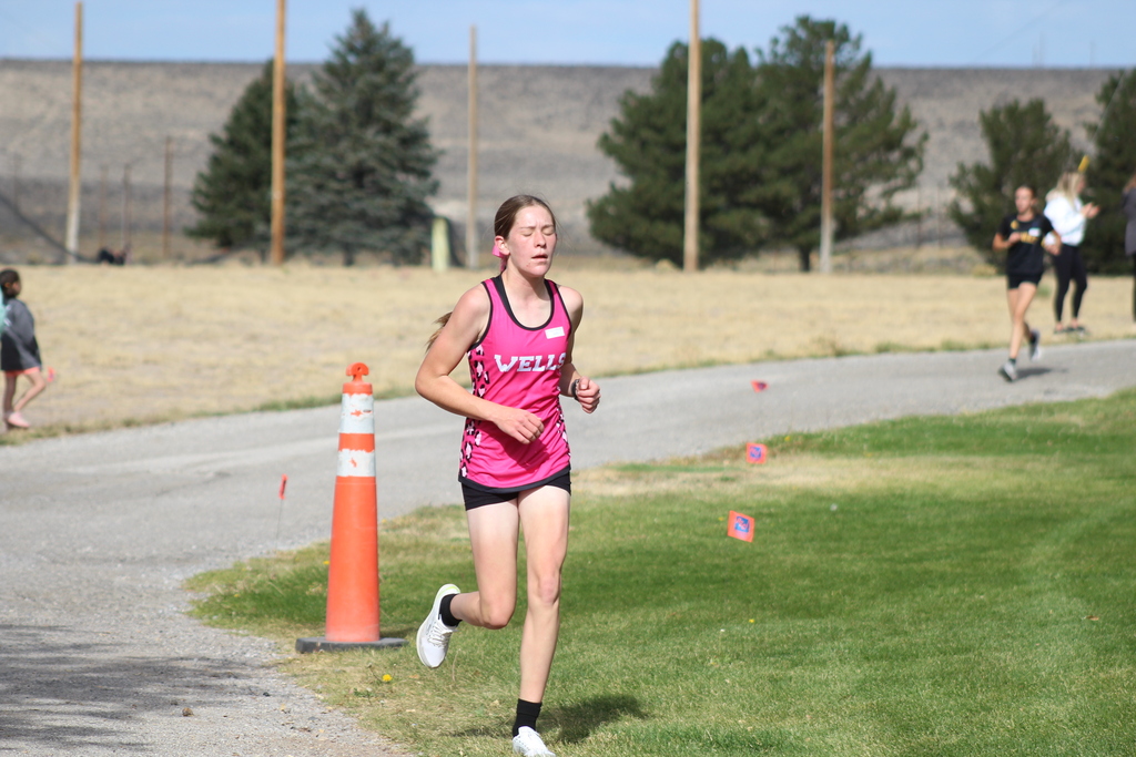 Wells High School cross country runner at the Chimney Rock Golf Course