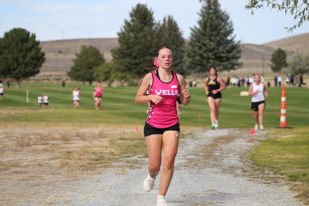 Wells High School cross country runner at the Chimney Rock Golf Course