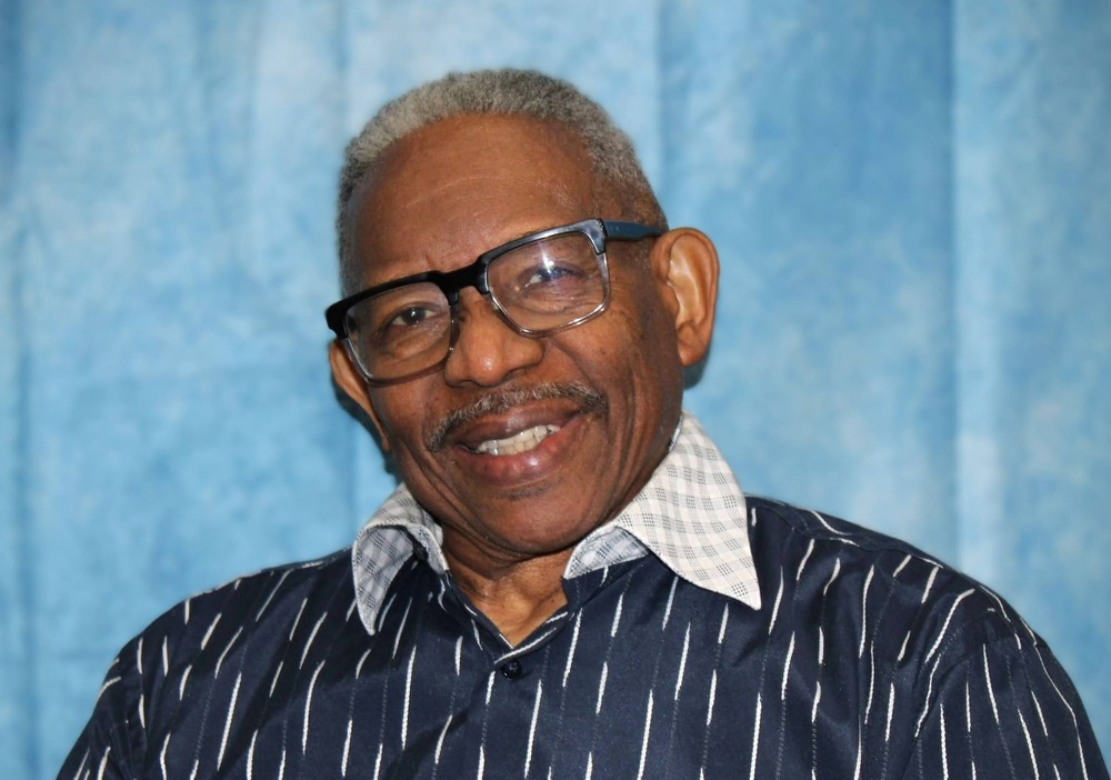 Re. Julius Collins