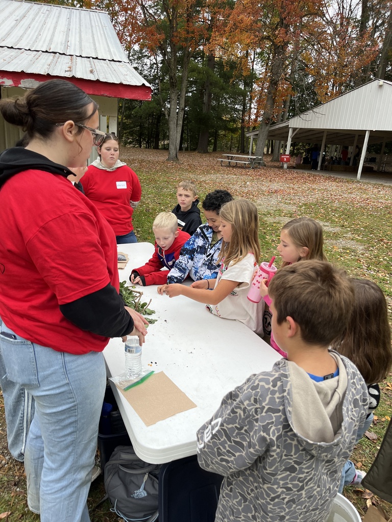 Ag students teacher and assisting 3rd graders from various schools