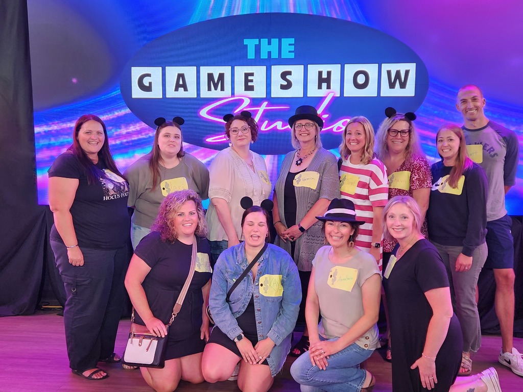 🎬✨ Over the summer, a group of our high school staff enjoyed an evening of fun and team bonding at The Game Show Experience in the Twin Cities!  They got the chance to step into a Hollywood-inspired game show studio and take part in an immersive world of laughter, challenges, and team spirit. 🎤🎉  We love seeing our staff come together outside of school—it makes our Panther team even stronger! 🐾💜  #PantherPride #TeamECSD #GameShowExperience