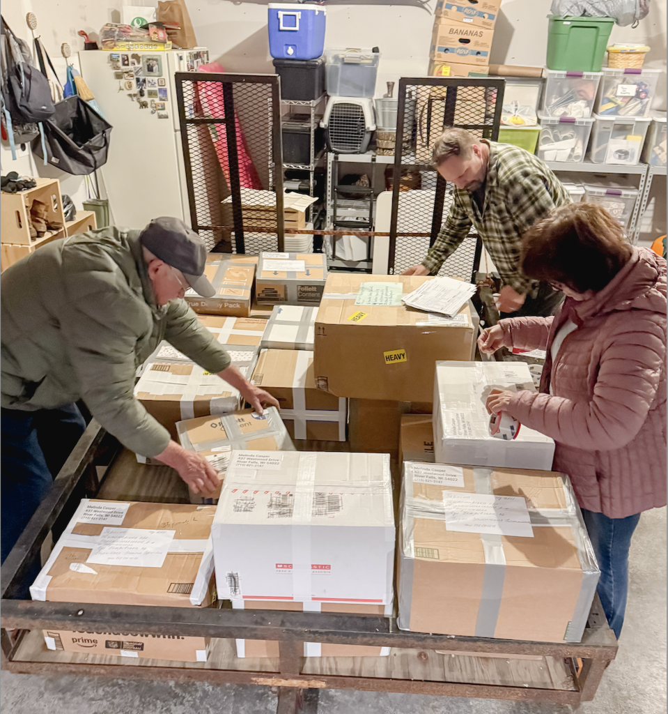 On October 19, the Ellsworth Hearts & Minds group completed another successful shipment of school supplies and comfort items to Ukraine, this time to a school in Radomyshl', located in the region of Zhytomyr Oblast in north-central Ukraine, about 70 miles west of Kyiv. After months of dedicated fundraising, the Hearts & Minds students raised enough money to purchase the supplies and cover shipping costs. With help from Day of Service volunteers, supplies were packaged. With the help of Ryan, my dad, Tom Benson, and his wife, Valentyna—who is from Radomyshl—19 boxes were labeled and shipped, each one carrying the compassion, encouragement, and hope of an entire school community reaching across the world.