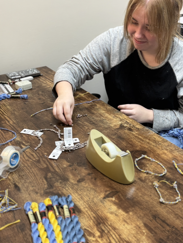 On October 19, the Ellsworth Hearts & Minds group completed another successful shipment of school supplies and comfort items to Ukraine, this time to a school in Radomyshl', located in the region of Zhytomyr Oblast in north-central Ukraine, about 70 miles west of Kyiv. After months of dedicated fundraising, the Hearts & Minds students raised enough money to purchase the supplies and cover shipping costs. With help from Day of Service volunteers, supplies were packaged. With the help of Ryan, my dad, Tom Benson, and his wife, Valentyna—who is from Radomyshl—19 boxes were labeled and shipped, each one carrying the compassion, encouragement, and hope of an entire school community reaching across the world.