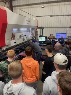 Mr. Manosky’s Tech Ed students took a field trip to Bloomer Machine & Fabrication where they got an inside look at CNC machines, laser cutters, and welders in action. 💥 Students even got some hands-on experience — using a press brake to bend their own miniature “Panther Mobile” complete with the Ellsworth logo laser-etched on the hood! 🐾 What an awesome opportunity to see advanced manufacturing in action and bring their learning to life!