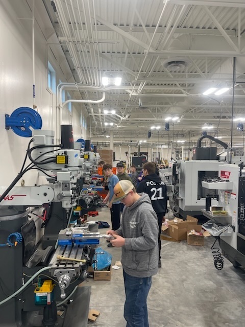 Mr. Manosky’s introduction to industrial technology class took a walk to Nielsen’s grocery today to test out the soda bottle openers they made on our new Haas manual mills. #CTE #fabricate