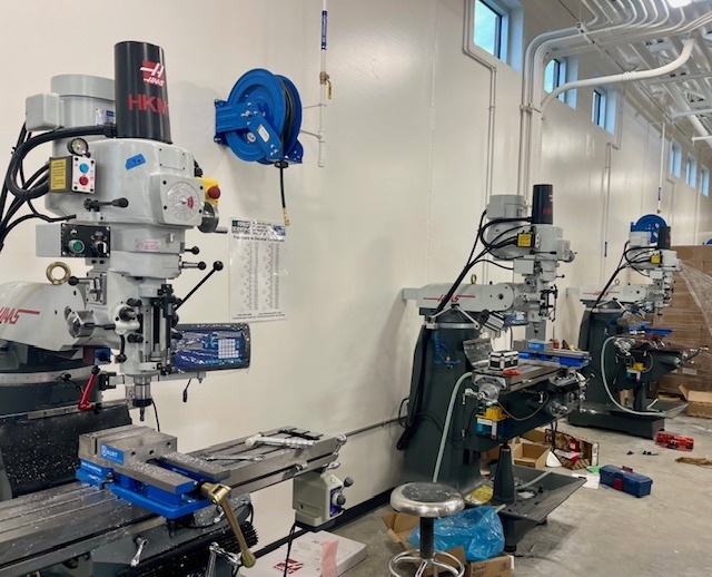 Mr. Manosky’s introduction to industrial technology class took a walk to Nielsen’s grocery today to test out the soda bottle openers they made on our new Haas manual mills. #CTE #fabricate