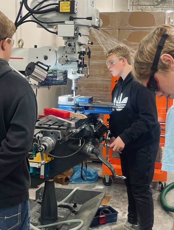 Mr. Manosky’s introduction to industrial technology class took a walk to Nielsen’s grocery today to test out the soda bottle openers they made on our new Haas manual mills. #CTE #fabricate