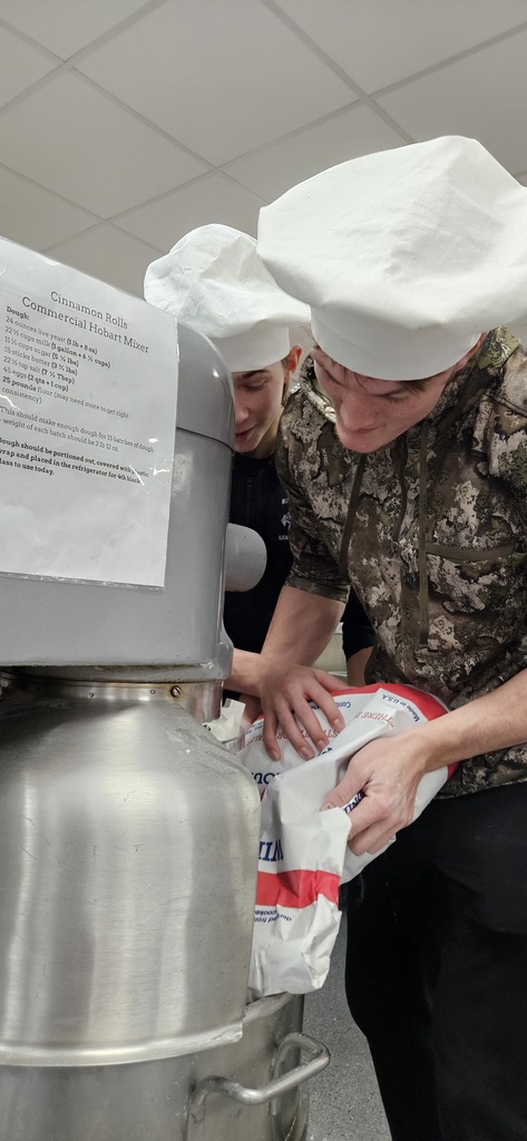 Mrs. Johnson’s Food Service class is in full swing with cinnamon roll production in the foods room, and things are smelling amazing. Students have been busy mixing, rolling, and baking using our new commercial equipment—talk about an upgrade! We’re especially loving the 80-quart commercial mixer, which has been a game changer for large-batch baking. The commercial kitchen and equipment were part of the high school remodel this summer, and it’s exciting to see our students using these tools firsthand. Hands-on learning, great food, and a beautiful new space… we’d call that a win. 💜👩🍳🐾