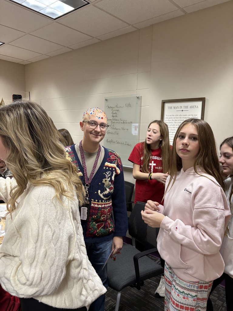 Talk about being good sports! 😄✨  At EMS, we celebrated WinterFest today before kicking off our holiday break, and one group of 8th grade girls had a very creative way to spread some school spirit. They earned the chance to bedazzle Principal Morrison, band director Mr. Morley, and our new PE teacher Mr. Campbell.  Thanks to these three for being such great sports and helping make WinterFest a memorable way to wrap up the semester! 💜❄️