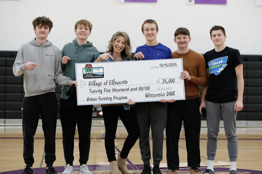 🌱 Big news for Ellsworth and it all started with our students! 🌱  Today at the Ellsworth High School Holiday Pep Fest, we were excited to share that the Village of Ellsworth has been awarded a $25,000 Urban Forestry Grant from the Wisconsin Department of Natural Resources.  This milestone began as a student-led idea. As part of their Capstone Project, students Cameron Lutfi, Thomas Helseth, Milan Johnson, Max Olson, and Jacob Michels presented to the Village Board earlier this year with a vision for Ellsworth to place a stronger focus on trees, sustainability, and becoming a Tree City USA community. They shared how trees contribute to the health, beauty, and long-term vitality of a community, and their work helped spark the decision to apply for this grant.  The funding will support the development of an urban forestry program, helping Ellsworth grow in thoughtful and sustainable ways for years to come.  A huge thank you to these students for their leadership, research, and willingness to speak up. This is a great example of how local leadership can start at any age. We’re proud of you and excited for what’s ahead for Ellsworth! 👏🌳