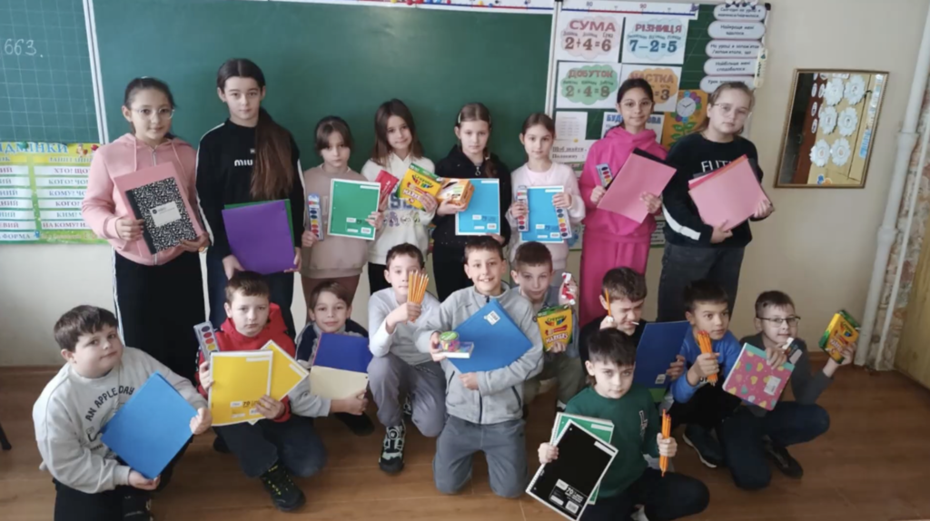 💙💛 An update we’ve been hoping to share  We received a message from the principal of Radomyshl HUB Lyceum 2 letting us know that the school supplies our students raised and shipped have arrived safely.  The principal shared that the pupils and teachers were extremely pleasantly surprised. The school supplies will be used during lessons and for creative activities. The blankets will be especially helpful when students are in shelters during air raid alerts. The torches are critical during power outages, and the calculators will be put to good use in math classes.  Most meaningful of all, they shared how much the gifts, fundraising effort, and letters of support meant to them. They said the entire shipment brought joy and a strong feeling of support, and that they were deeply touched by our students’ kindness.  We are so proud of our students for organizing this fundraiser and showing what it means to care for others, even across the world. 💜🐾