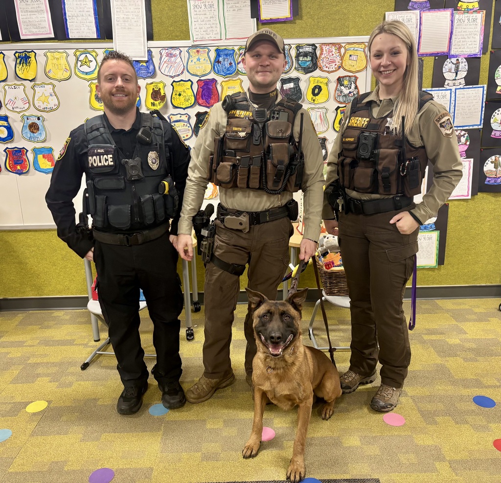 Our second graders recently wrapped up their government unit on Rules and Laws in a very meaningful way. ❤️ After learning about how rules and laws help keep our communities safe, students enjoyed visits from Officer Paul, Deputy Smith, Deputy Huppert, and K9 Ares. The officers made great connections between what students were learning in class and how it applies in real life here in our community. As part of the unit, second grade students also collected food and easy to eat snacks for officers from Pierce County, St. Croix County, and the Woodville Police Department. These snacks were chosen with busy schedules in mind and were a small way to say thank you for all they do. Our students asked thoughtful questions, made great connections to their learning, and showed just how engaged and caring they are. What a great example of learning in action. 💜🐾