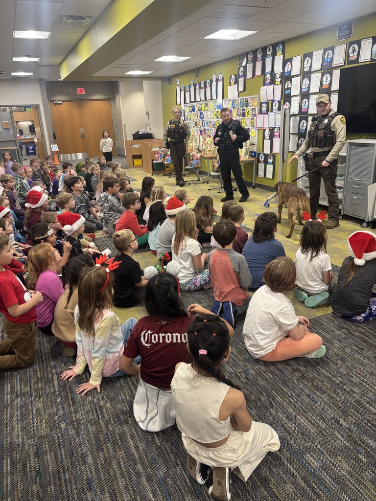 Our second graders recently wrapped up their government unit on Rules and Laws in a very meaningful way. ❤️ After learning about how rules and laws help keep our communities safe, students enjoyed visits from Officer Paul, Deputy Smith, Deputy Huppert, and K9 Ares. The officers made great connections between what students were learning in class and how it applies in real life here in our community. As part of the unit, second grade students also collected food and easy to eat snacks for officers from Pierce County, St. Croix County, and the Woodville Police Department. These snacks were chosen with busy schedules in mind and were a small way to say thank you for all they do. Our students asked thoughtful questions, made great connections to their learning, and showed just how engaged and caring they are. What a great example of learning in action. 💜🐾