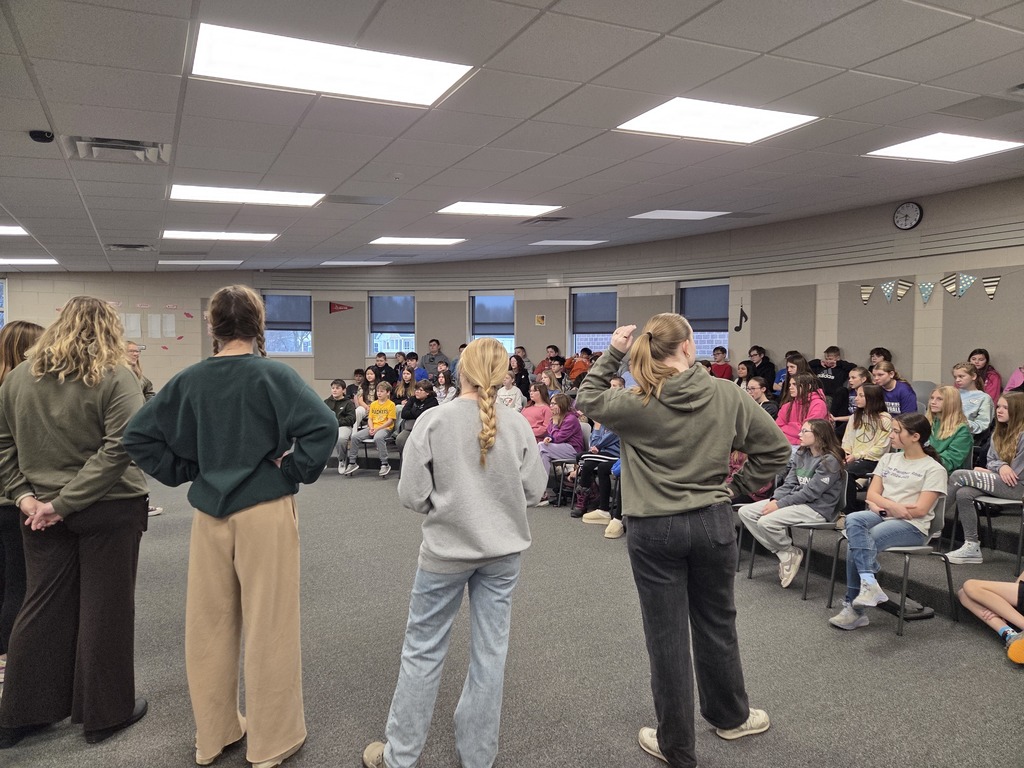 🎶 A Cappella at EMS! 🎶 We recently had the UW–Eau Claire Audacious A Cappella visit our middle school choir students for a fun and inspiring session. They shared what makes a cappella so unique and gave our students a great look at vocal music beyond the classroom. It was extra special to welcome back Maci Gutting, who joined the group for the visit. 💜🐾 Thanks for spending time with our students and sharing your love of music. Panther Pride!
