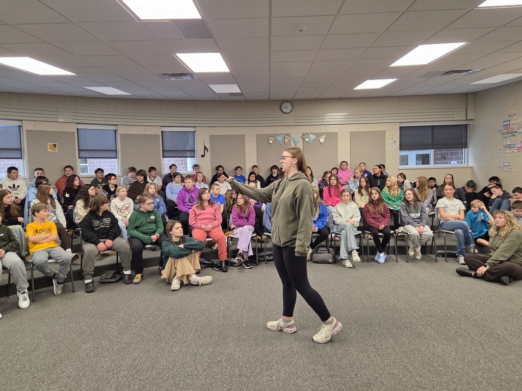 🎶 A Cappella at EMS! 🎶 We recently had the UW–Eau Claire Audacious A Cappella visit our middle school choir students for a fun and inspiring session. They shared what makes a cappella so unique and gave our students a great look at vocal music beyond the classroom. It was extra special to welcome back Maci Gutting, who joined the group for the visit. 💜🐾 Thanks for spending time with our students and sharing your love of music. Panther Pride!