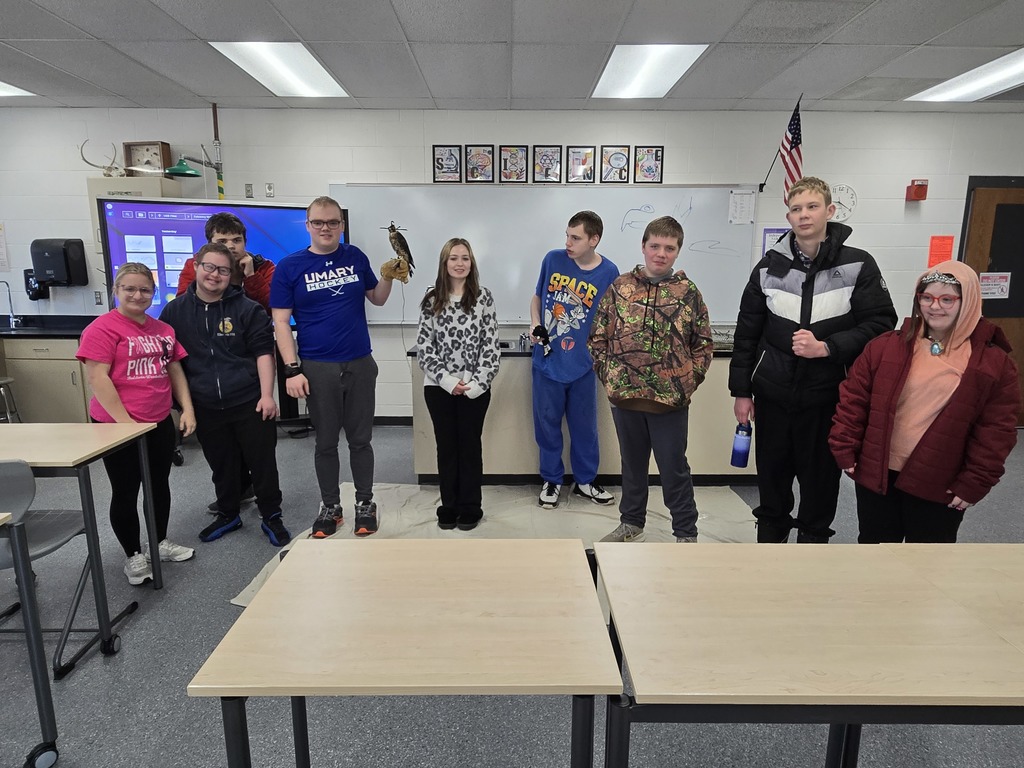🦅 What an amazing experience for our students!  We were excited to welcome Steve Kaufer back again this year to share his falconry expertise with Mrs. Klecker’s Biology classes. Steve and his daughter Bethany, now an 11th grader, brought in two incredible birds and a whole lot of knowledge and passion.  Steve talked with students about the history of falconry, how he first became interested, the unique skills and adaptations of different birds of prey, and how important these birds are to keeping ecosystems in balance. He also shared how falconry has become something special he gets to do with his family.  Students had the chance to meet Merida, a Red Tailed Hawk and Bethany’s bird, along with a Merlin, and learn how their different traits help them survive in the wild. Some students even got to hold the birds, which made the experience even more memorable. We also had students from Ms. Sara White’s Room 220 join in on the fun.  A big thank you to Steve and Bethany for another fantastic visit. If you want to see more of their falconry adventures, you can follow Steve on Instagram at sun_flower_steve.